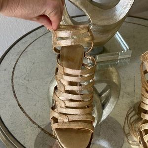 Vince Camuto never worn gold strap heels.